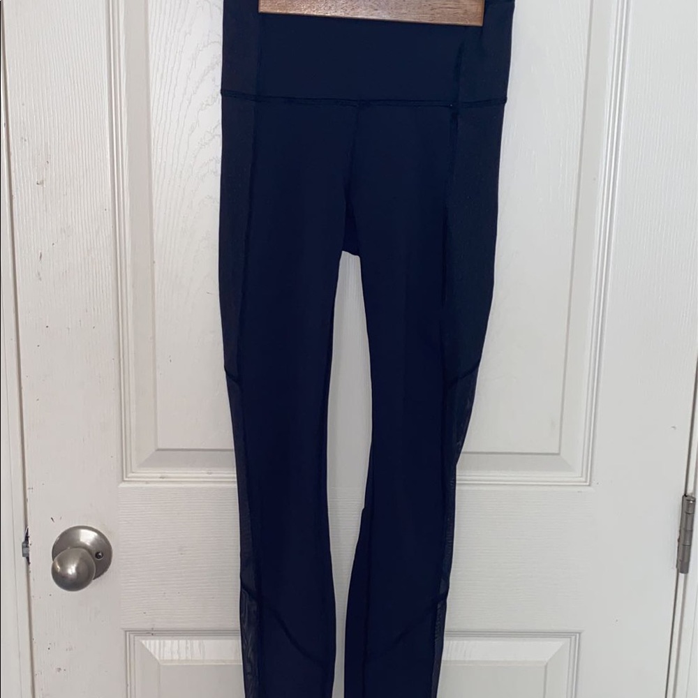 Navy blue lululemon leggings with mesh